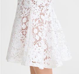 White lace dress on a white background