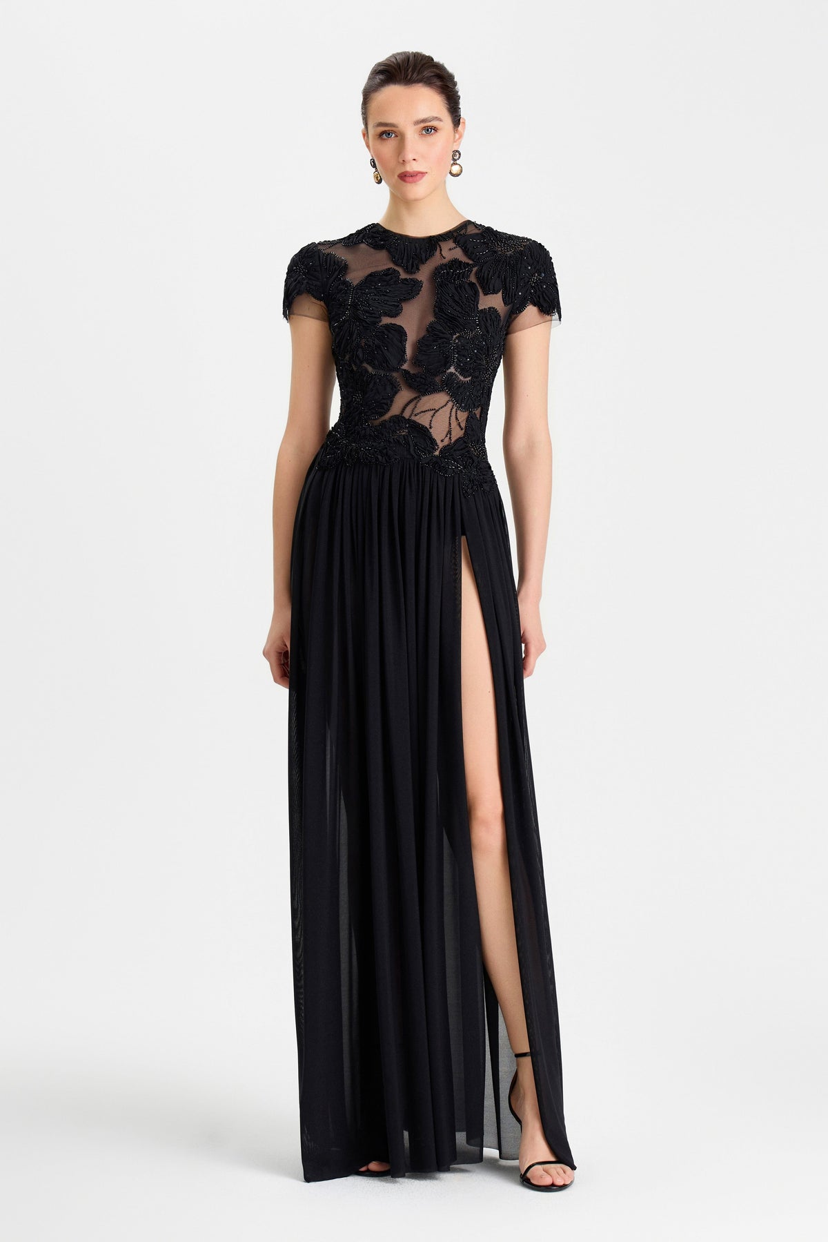 black long dress nearby Nadine Merabi Sloane 8 A delicately placed floral